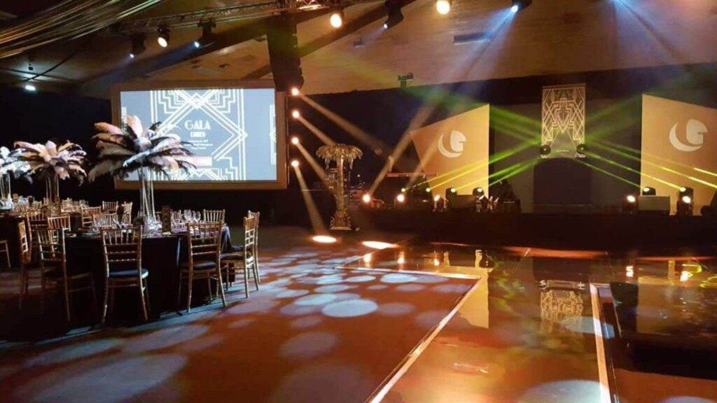 Stage set up for gala dinner at Gleneagles Arena.
