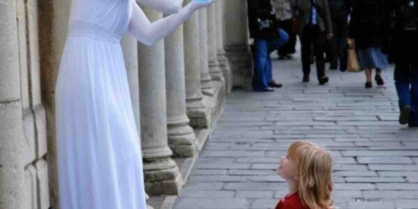 Grecian-Contact-Juggler-Entertaining-Children