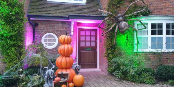 Halloween-House-Dressing-Front-Of-House-With-Giant-Spider-Hanging-Prop