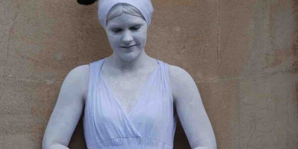 Pigeon-Sitting-On-Greek-Living-Statue