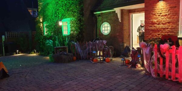 Team-Transforming-Front-Of-Home-For-Halloween
