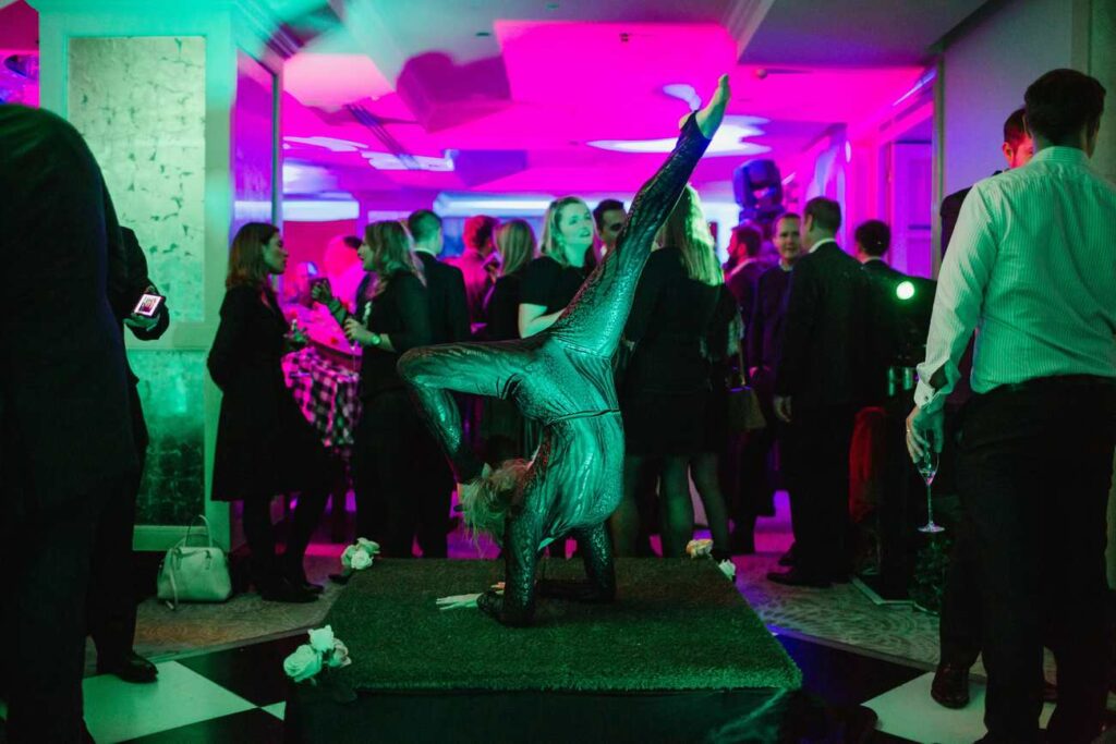 Twisted Alice In Wonderland themed contortionist performer.
