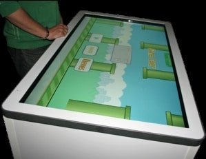 Giant iPad table available to book for exhibition events and public brand activations.