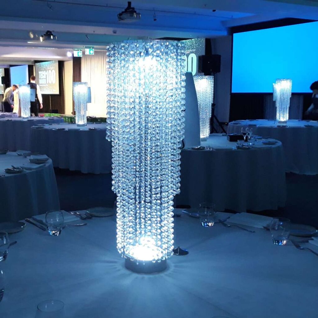 Crystal column table centrepiece for events.