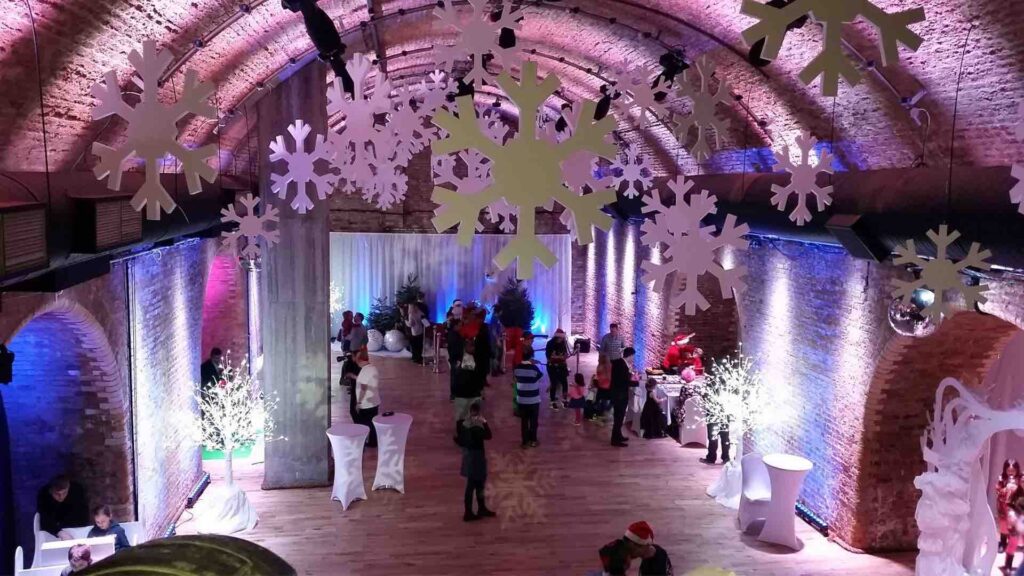 Snowflakes decorations hanging from the ceiling of the venue