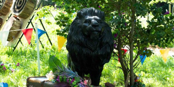 Giant lion prop part of a jungle themed event.