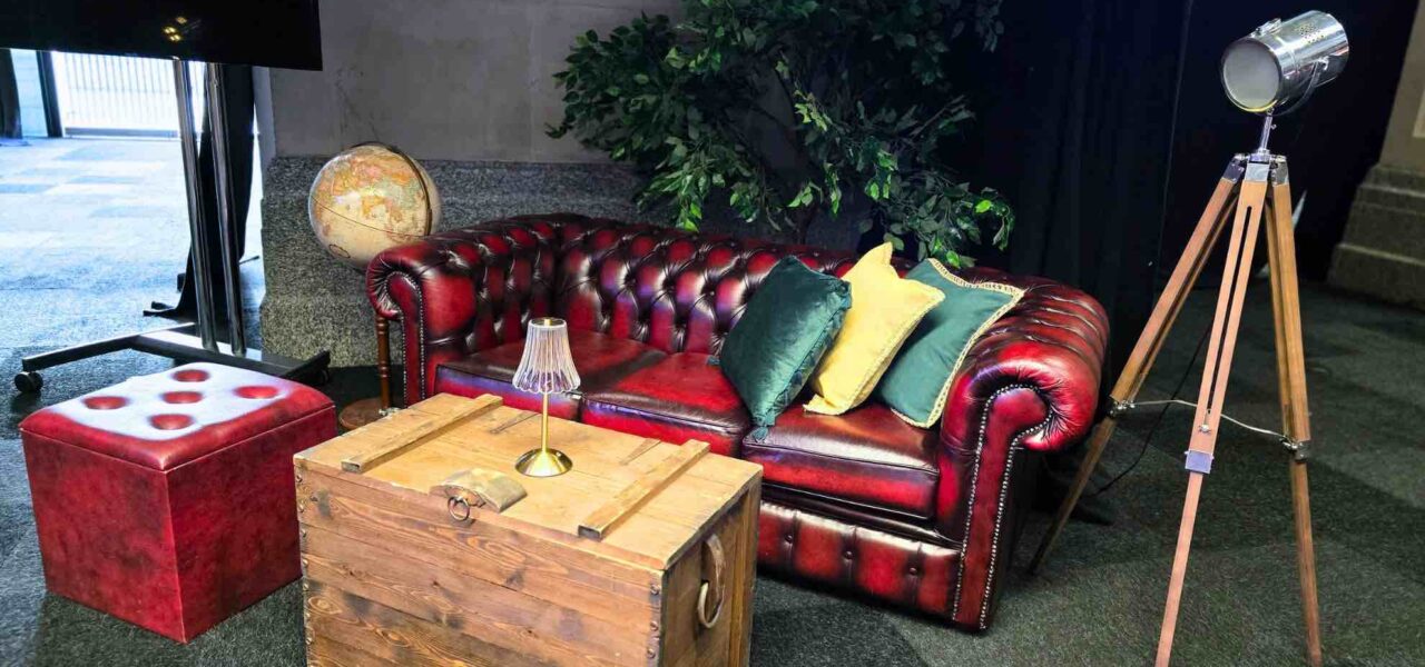 Leather-Sofas-And-Crates-Setup-For-1940s-Events