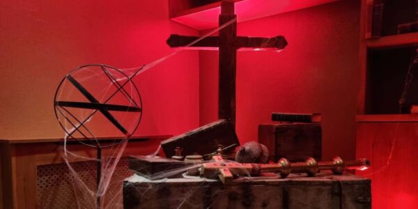Medieval cross props used for a spooky medieval theme.