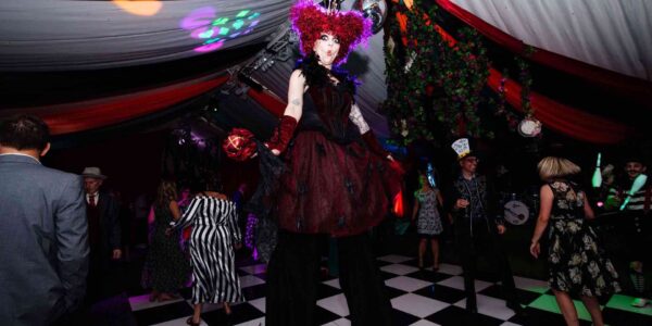 Red-Queen-Stilt-Performer