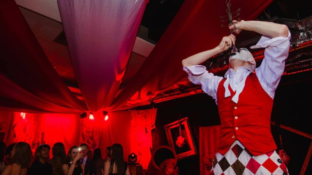 Expert halloween themed sword swallower
