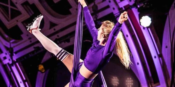 Aerial-Performer-During-Football-Themed-Show
