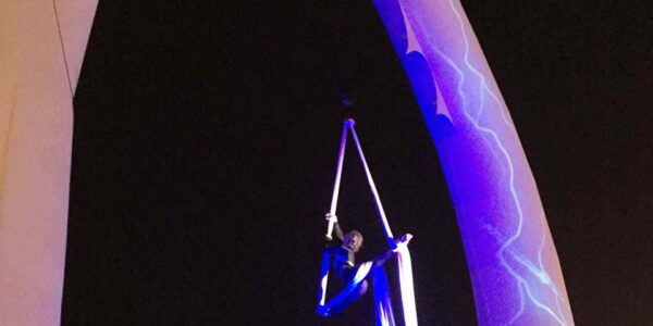 Aerialist-Performing-From-Silk-Hanging-From-Inflatable