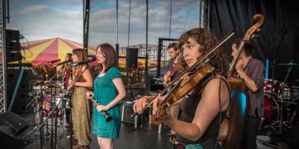 Band-Performing-On-Stage-At-Corporate-Festival