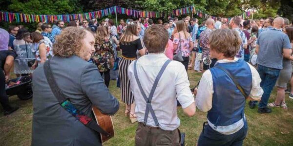 Band-Trio-Entertaining-Festival-Guests