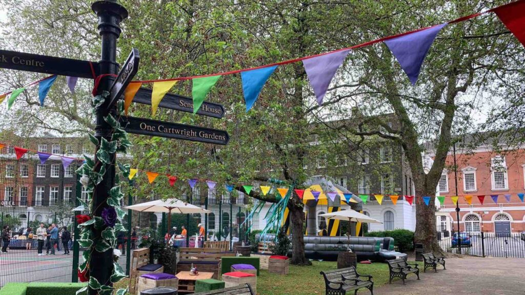 Public park transformed into festival theme with colourful bunting and decor