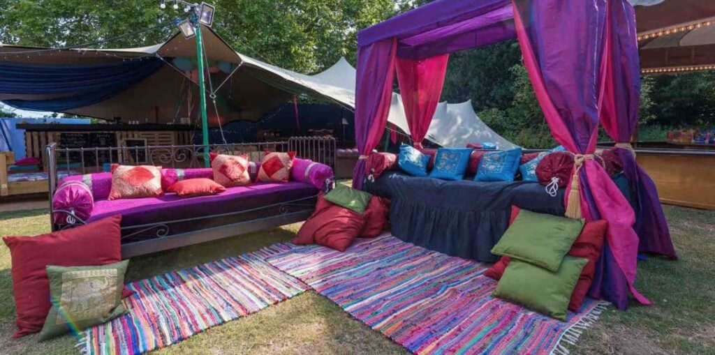 Stylish seating area for guests to unwind at corporate summer festival.