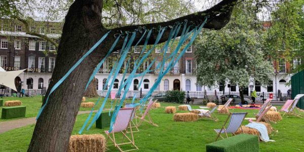 Festival-Streamer-Decorations-Hanging-From-Trees