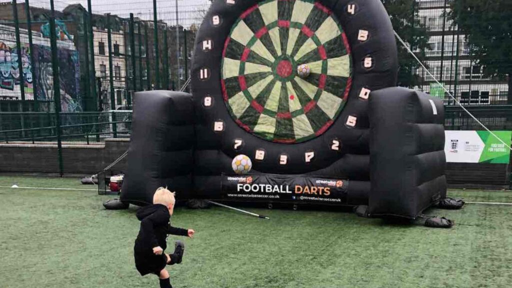 Inflatable football game darts.
