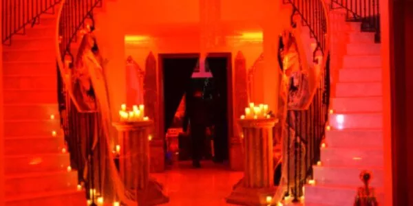 Hallway-Of-Venue-Decorated-For-Occult-Halloween-Themed-Event