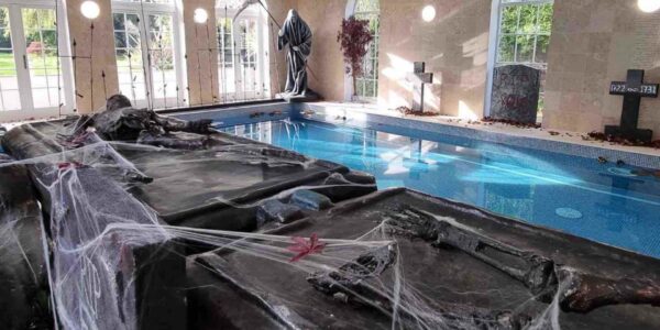 Pool-Area-Of-Venue-Decorated-To-Look-Like-Graveyard