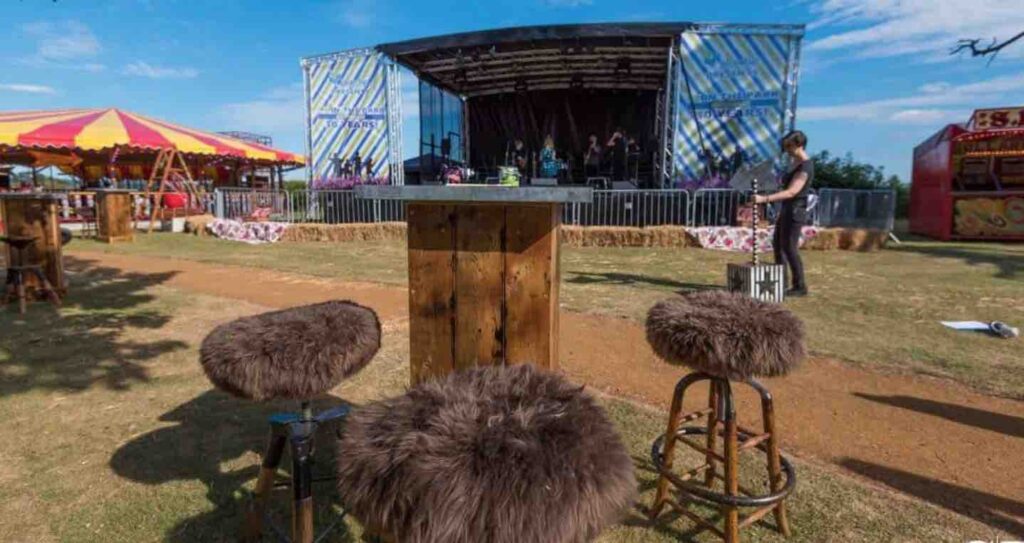 Stage and lighting set up for private hire mini summer festival.