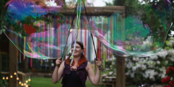 Walkabout-Bubble-Performer-At-Outdoor-Festival