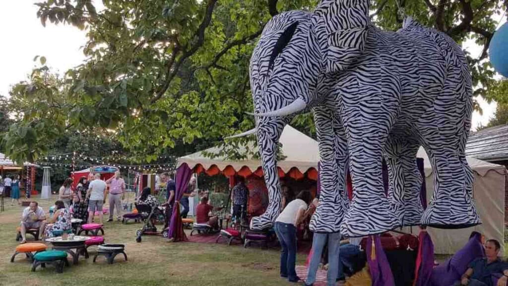 Black and white stripe elephant prop decorating outdoor event space