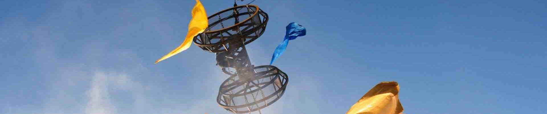 Silk-Aerialist-Hangs-From-Crane Silk-Aerialist-Hangs-From-Crane