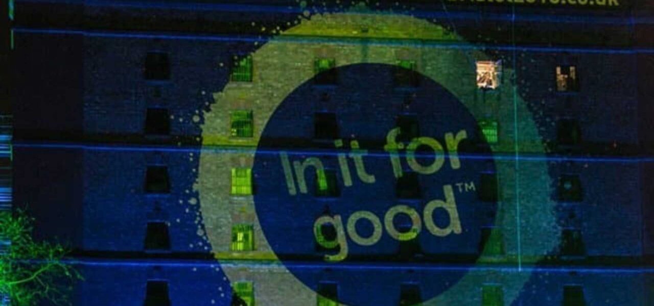 Slogan-Projected-On-Building