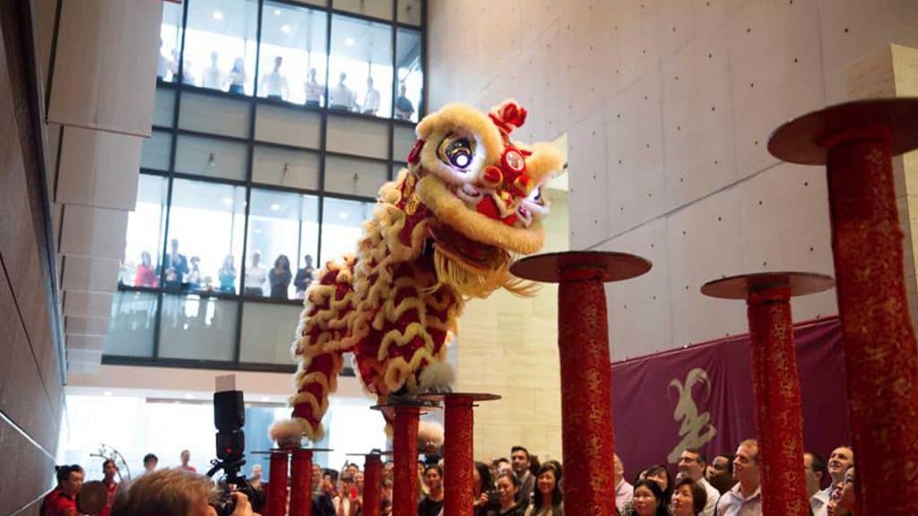 Jumping lion dancers as part of entertainment package provided for Chinese New Year event.
