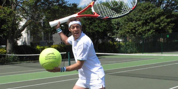 Comedy-Tennis-Player-Bat-And-Ball
