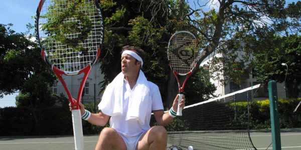 Comedy-Tennis-Player-Gigantic-Rackets