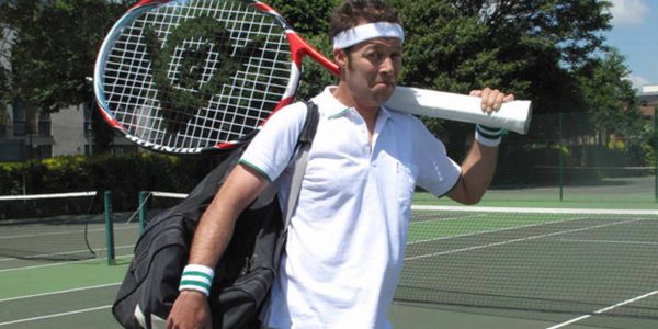 Comedy-Tennis-Player-With-Gigantic-Racket