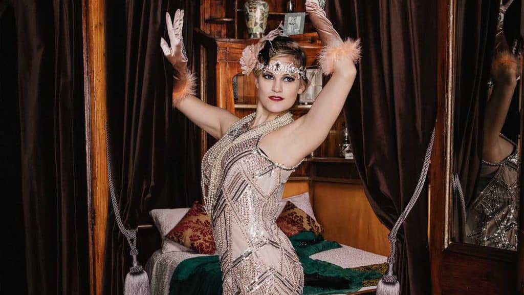 Performer in 1920's flapper girl inspired costume. Great for Peaky Blinders and Great Gatsby events.