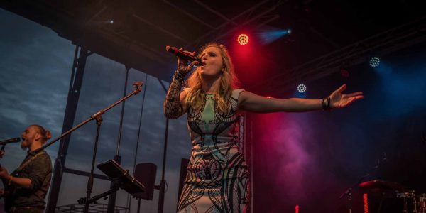 Singer on stage at festival