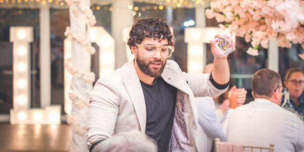 Card-Trick-Magician-Entertaining-At-Private-Event