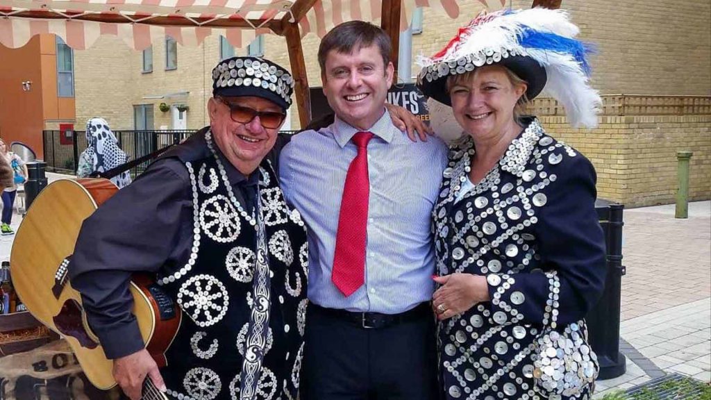 Pearly King and Queen in full costume, hired as part of British themed event production