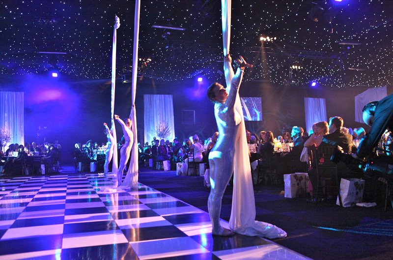 Ribbon Dancers performing on a dance floor at a Gala Dinner and Awards Ceremony event in London.