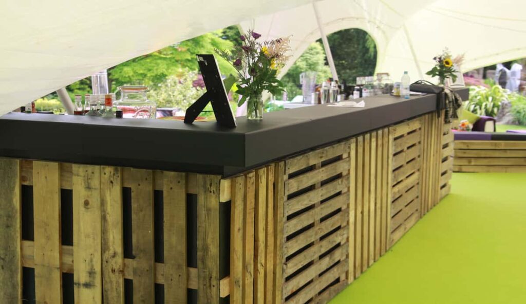 Pallet bar we created for our client's Woodstock themed party.