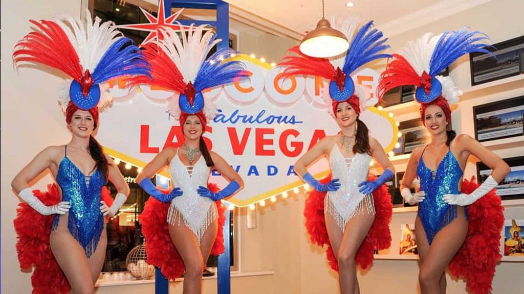 Las Vegas venue sign and vegas girls used as part of our Vegas venue theming package