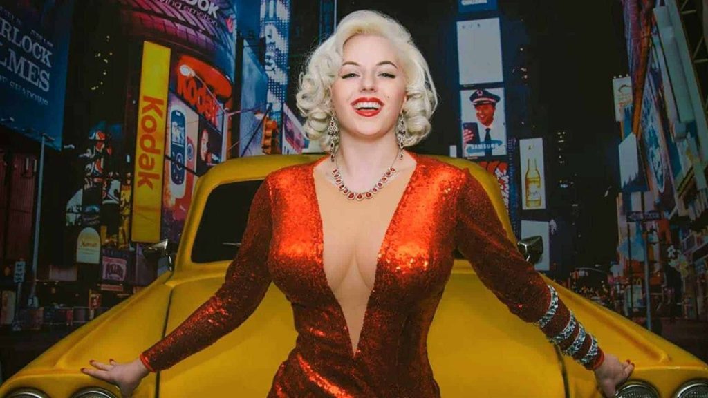 Marilyn Monroe lookalike standing in front on yellow cab with New York background. Hired as part of entertainment for Las Vegas Themed Event