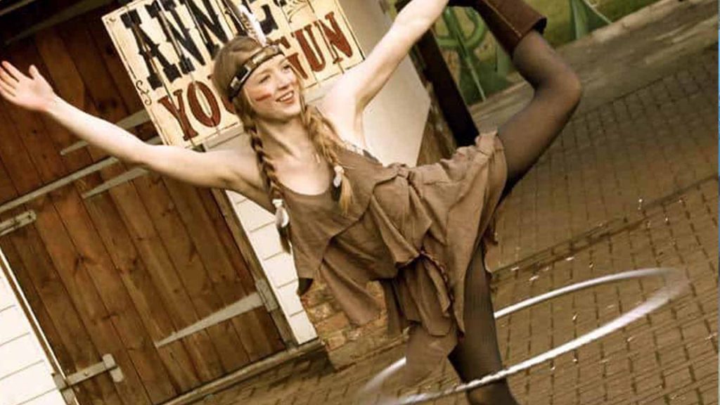 American Indian hula hoop dancer as part of Cowboys and Indians themed entertainment. Available to hire London UK