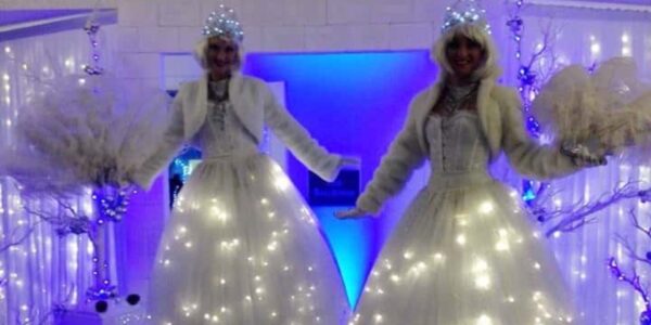 Light-Up-Christmas-Stilt-Performers