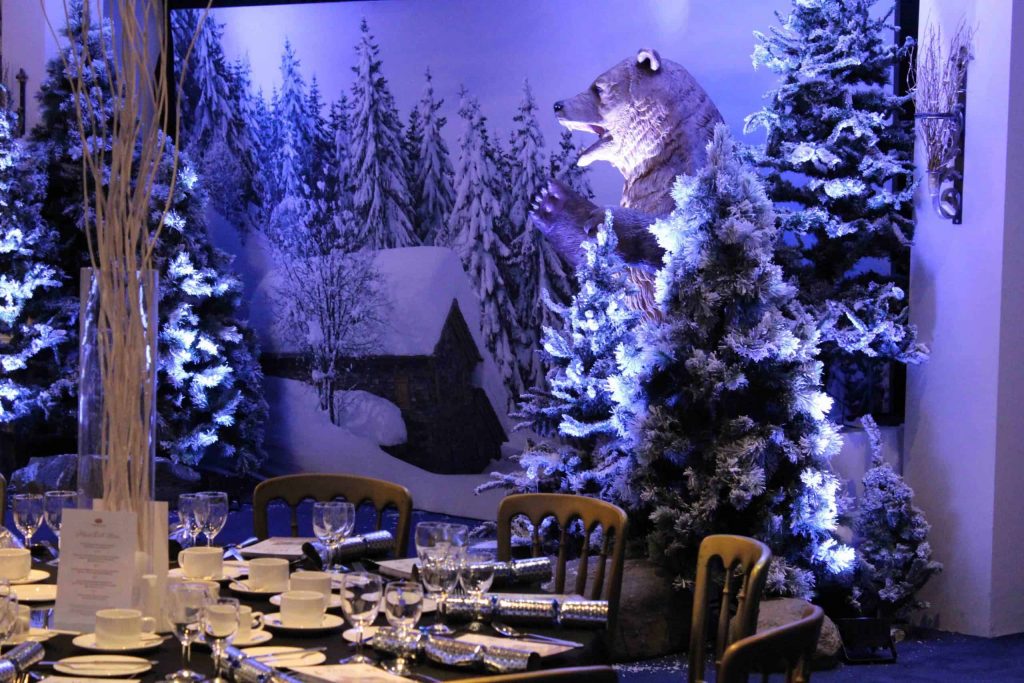 Using our Creative Event Theming we transformed this empty venue into a Winter Wonderland. Using a Winter Wonderland backdrop with Giant Polar bear prop and Christmas trees to decorate a Christmas Gala dinner.