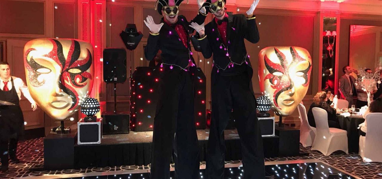 Masked-jester-stilt-perfromers