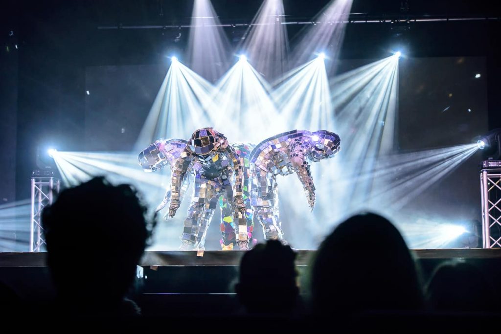 Mirror Dance Show being performed in front of a live audience on stage at a corporate event in London, UK. Contact us to enquire about our UK Dance Groups and Dancers for hire in the UK and Internationally.