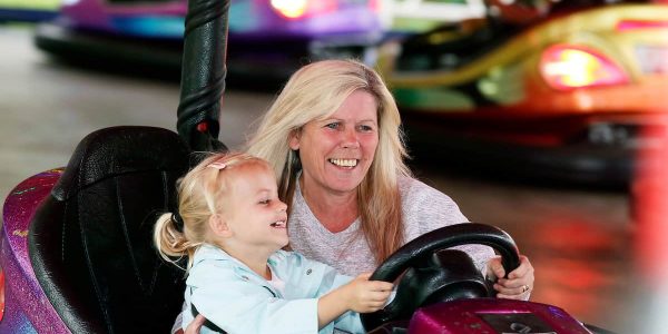 Mum-and-daughter-in-dodgem-car-ride
