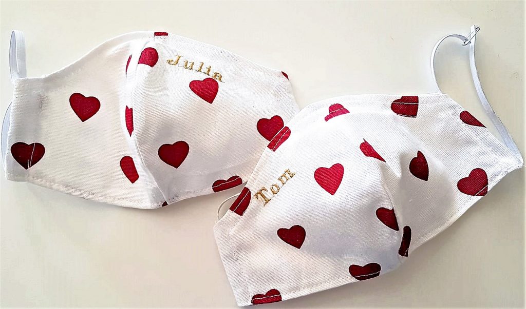 Love themed face masks with little red love hearts and names embroider on them. Great for wearing at wedding venue
