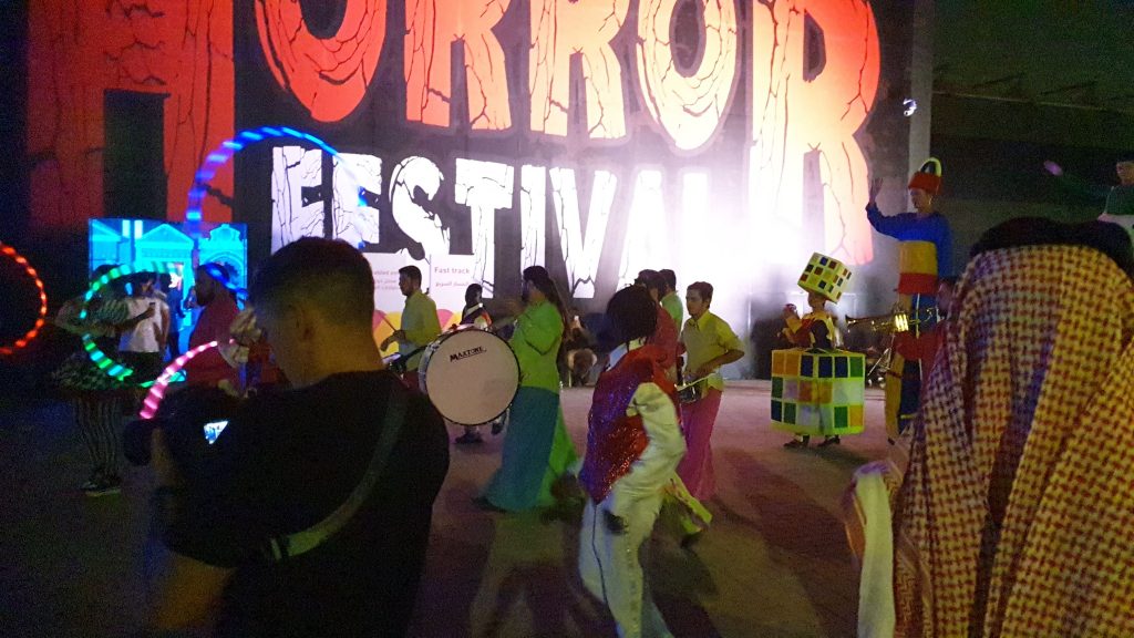 Entrance into Horror Festival Saudi Arabia featuring parade of walk about performers