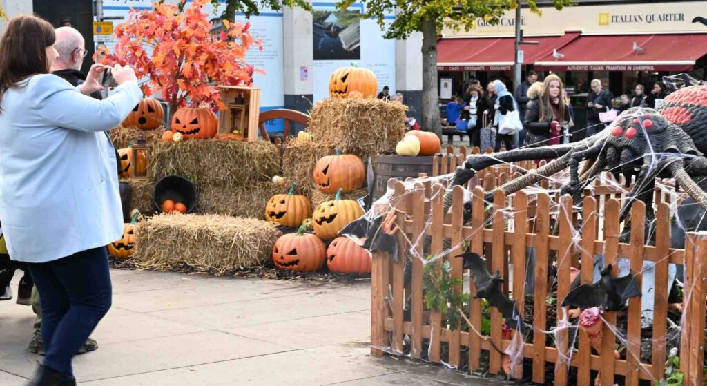 Pumpkin yard set design and giant spider prop set design outside in Liverpool town centre designed for a community town event.